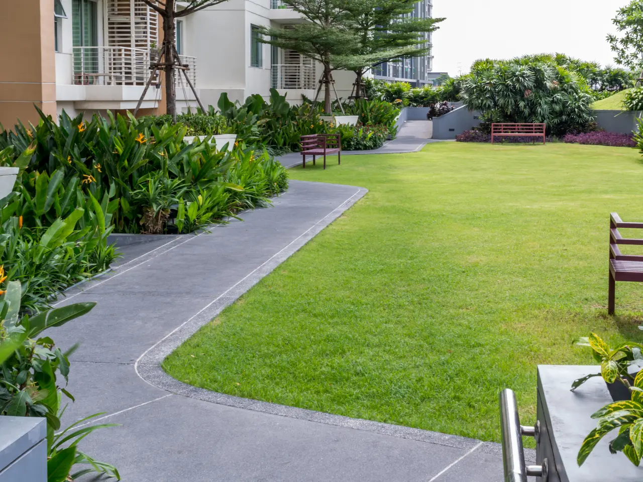 Manicured lawn and garden path leading to a Greenville, SC home